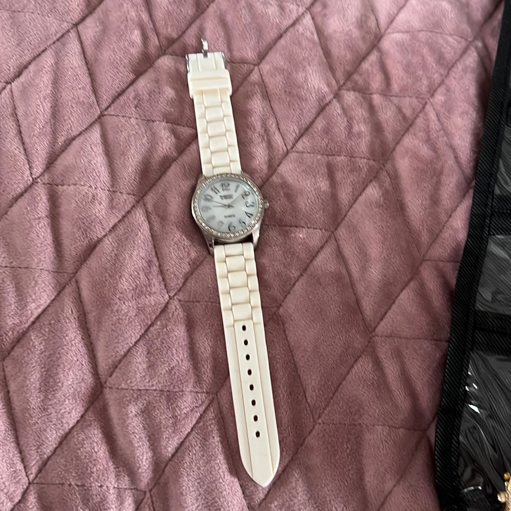 Embassy by Gruen watch has plastic/rubber white band